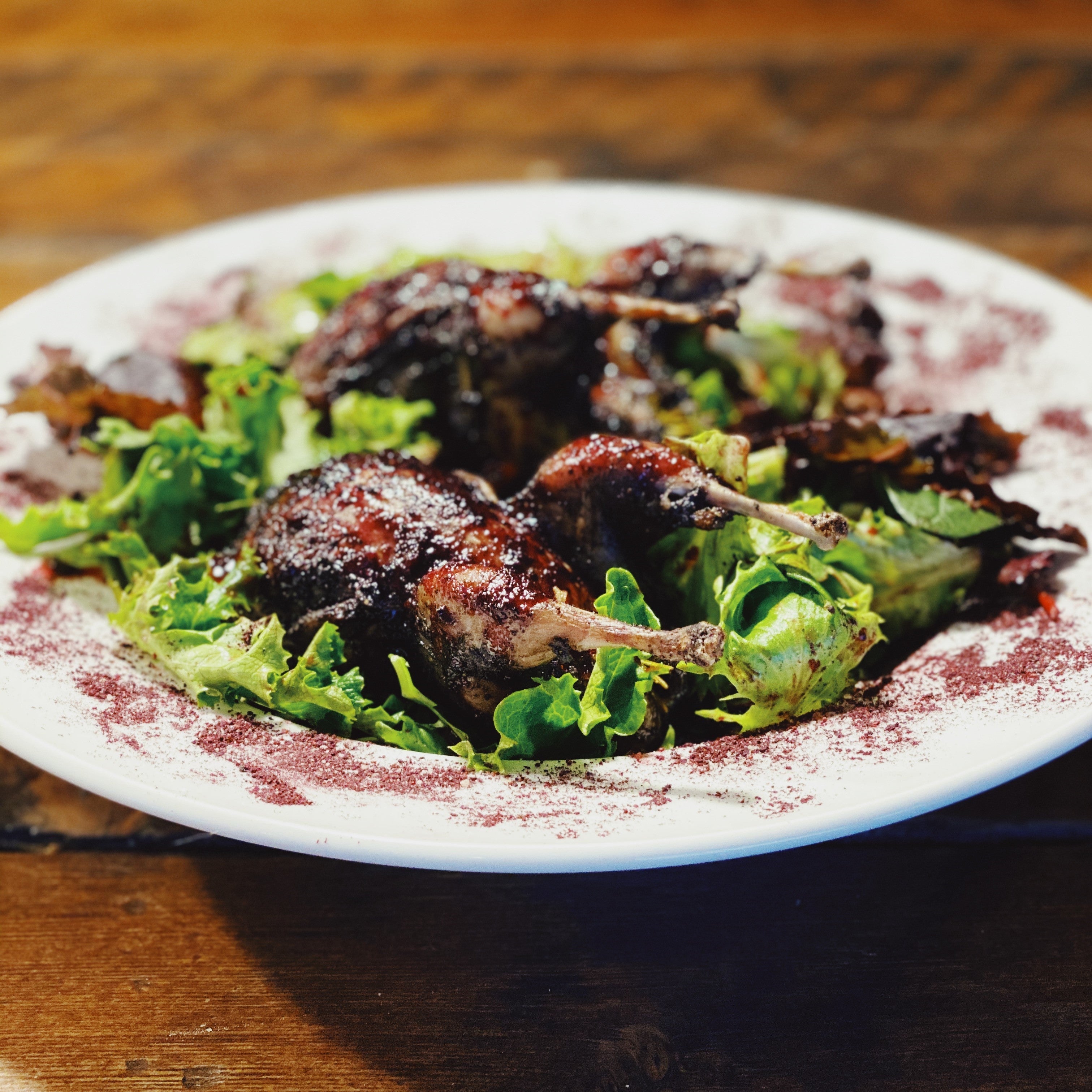 Roasted Quail with Heirloom Powder and Blueberry Marinade